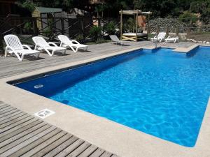 Bazén v ubytování Hostal Arce Marrón nebo v jeho okolí