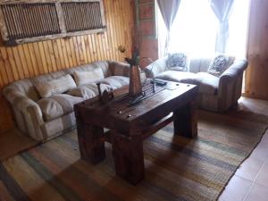 Posezení v ubytování Hostal Arce Marrón