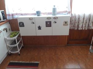 Kuchyň nebo kuchyňský kout v ubytování Hostal Arce Marrón