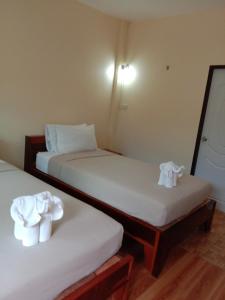 Katil atau katil-katil dalam bilik di Prik Thai Resort
