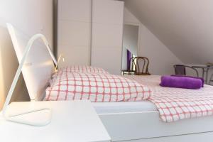 Posteľ alebo postele v izbe v ubytovaní Apartment Joe