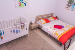 Posteľ alebo postele v izbe v ubytovaní Apartment Joe