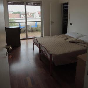A bed or beds in a room at Star Hostel