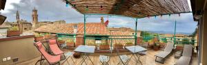 A balcony or terrace at La Bellavita B&B