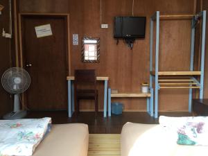 Postel nebo postele na pokoji v ubytování ซอยห้า โฮมสเตย์ เชียงคาน