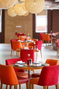 Veitingastaður eða matsölustaður á Royal Singi Hotel