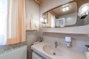 Koupelna v ubytování Apart Hotel Garni Wieser