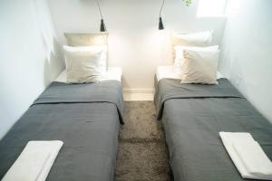 Postelja oz. postelje v sobi nastanitve Very central, new and comfy apartment with A/C
