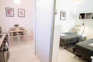 Postelja oz. postelje v sobi nastanitve Very central, new and comfy apartment with A/C