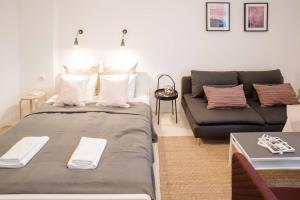 Postelja oz. postelje v sobi nastanitve Very central, new and comfy apartment with A/C