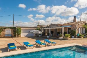 a villa with a swimming pool and a house at Villa Sa Canova by Mauter Villas in Ciutadella