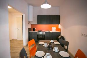Kuchyň nebo kuchyňský kout v ubytování Apartments A7