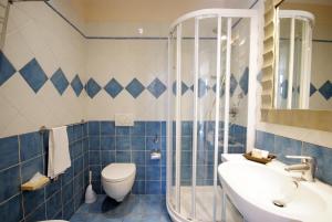 Ванная комната в Hotel La Perla Del Golfo