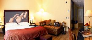 Posteľ alebo postele v izbe v ubytovaní Parc Hotel Flora S
