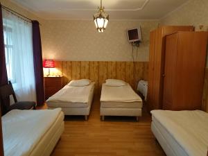 Cama o camas de una habitación en Dworek Galosa