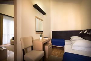Posteľ alebo postele v izbe v ubytovaní Apartment ACI Marina CRES