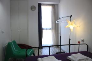 Postel nebo postele na pokoji v ubytování Studio-Hotel Loft Gudauri