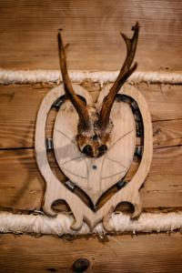 a pair of antlers in the shape of a heart at Eko Chata Sweet Home in Ustroń