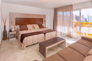 Postel nebo postele na pokoji v ubytování Hotel & SPA Dynastic