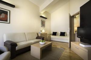 Televízia a/alebo spoločenská miestnosť v ubytovaní Apartment ACI Marina CRES