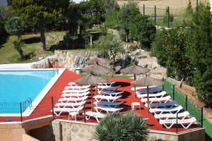 Bazén v ubytování Hotel Jardín nebo v jeho okolí