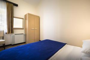 Posteľ alebo postele v izbe v ubytovaní Apartment ACI Marina CRES