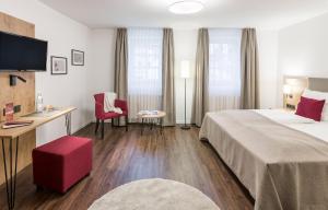 Postel nebo postele na pokoji v ubytování Hotel & Restaurant Lamm