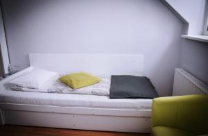 Ένα ή περισσότερα κρεβάτια σε δωμάτιο στο Zajazd Gołębiowski