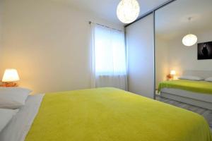 Postel nebo postele na pokoji v ubytování Apartment Kristina