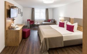 Postel nebo postele na pokoji v ubytování Hotel & Restaurant Lamm