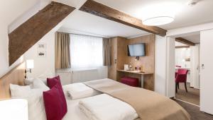 Postel nebo postele na pokoji v ubytování Hotel & Restaurant Lamm