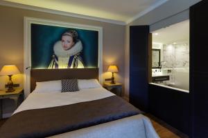 
Ein Bett oder Betten in einem Zimmer der Unterkunft Hotel Kasteel Bloemendal
