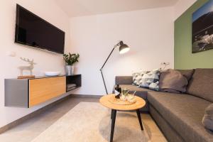 Telewizja i/lub zestaw kina domowego w obiekcie Easy Living Apartment Ötztal