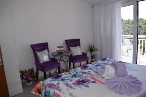 Posteľ alebo postele v izbe v ubytovaní Villa Zorana hostel