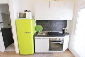 Kuchyňa alebo kuchynka v ubytovaní Hostdomus - Green Tech Apartment