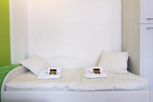 Posteľ alebo postele v izbe v ubytovaní Hostdomus - Green Tech Apartment