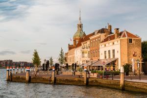 a group of buildings next to a body of water at Oranjepark in Dordrecht