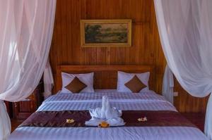 Ein Bett oder Betten in einem Zimmer der Unterkunft Villa Sande