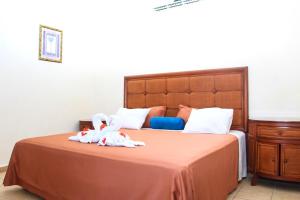 Voodi või voodid majutusasutuse West Bay Colonial toas