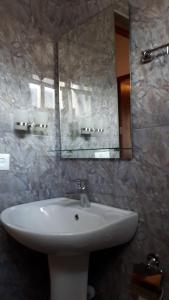 a bathroom with a sink and a mirror at Эдельвейс in Tsaghkadzor