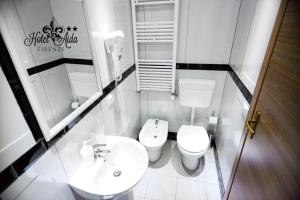 Koupelna v ubytování Hotel Aida