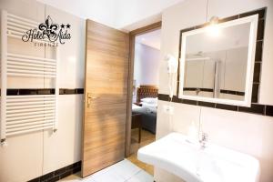 Koupelna v ubytování Hotel Aida
