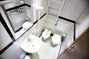 Koupelna v ubytování Hotel Aida