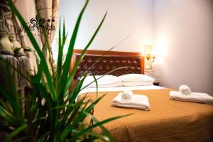 Postel nebo postele na pokoji v ubytování Hotel Aida + 21 fotografií
