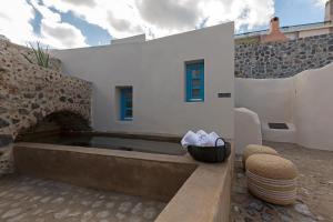 Fotografia z galérie ubytovania Alluvial Santorini Suites v destinácii Mesariá