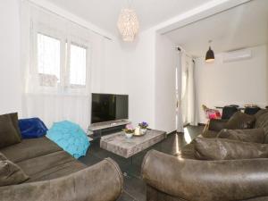 Posezení v ubytování Deluxe Apartman Porto