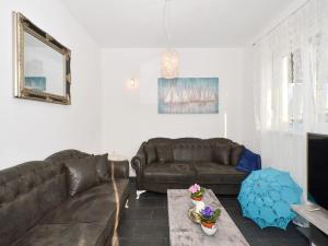 Posezení v ubytování Deluxe Apartman Porto