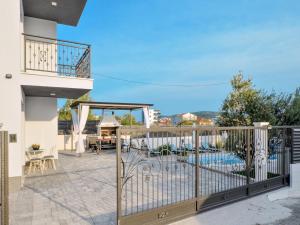 Balkón nebo terasa v ubytování Deluxe Apartman Porto