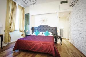Voodi või voodid majutusasutuse Hotel St. James toas