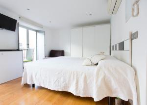 A bed or beds in a room at Casa Feria 60 Még 3 kép